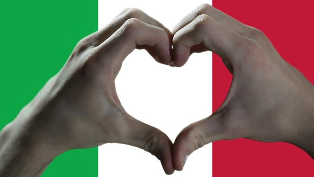 Hands showing Heart Sign over Italian Flag. 