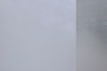 Urban Skyscrappers in Foggy Weather