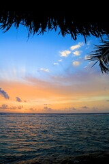 A sunset over a body of water