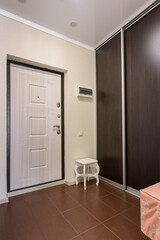 Entrance hall in a small one-room apartment of an apartment building