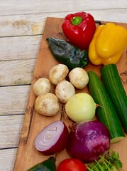 Fresh organic summer harvested vegetables washed and ready for preparing healthy meals and side dishes to share as a family