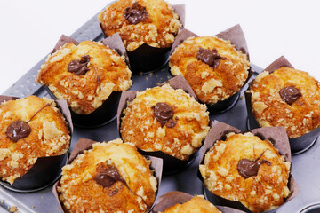 baked chocolate muffins in a metal tray
