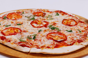 classic pizza margherita with tomato and basil