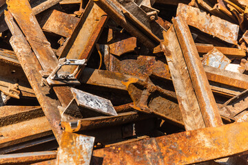 Rusted railroad tracks at a scrap yard