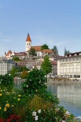 Fototapeta na wymiar Beautiful view of Castle hill and Aare riverside in Thun, Canton of Bern, Switzerland 