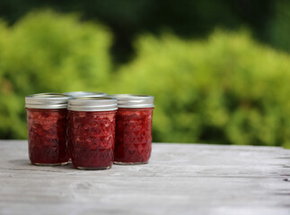 Four Jars of Homemade Strawberry Jam Room For Text