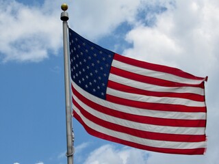 american flag waving in the wind