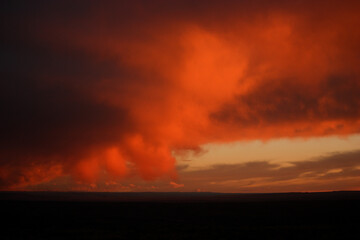 Fototapeta na wymiar Red Dramatic Cloud Over Green River, Wyoming