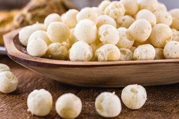 Basket with crispy manioc flour cookies. Brazilian biscuit called polvilho biscuit, gum or wind biscuit.