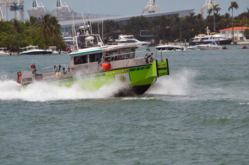 Miami-Dade fire rescue boat speeding across the Florida Intra-Coastal Waterway off of Miami Beach.