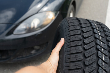 Black car's new tyre