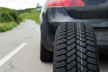 Black car's new tyre © Ocskay Mark