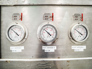 Pressure gauge of measuring instrument close up in industry zone at power plant with closed up