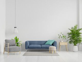 Blue Sofa and gray armchair in spacious living room interior with plants and shelves near wooden table.