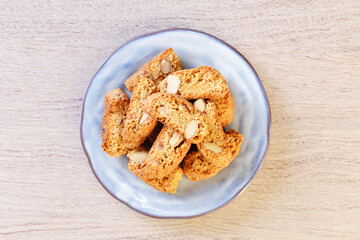 Classic Italian biscotti with almonds on wooden table 