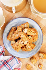Classic Italian biscotti with almonds on wooden table 