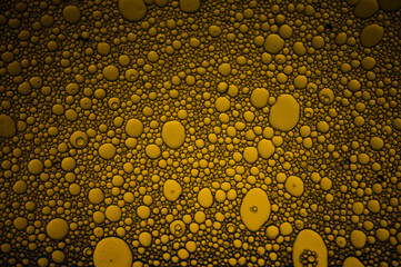 Abstract  Orange Colored Background from Volcanic Backgrounds Series. Oil stains on the water. Water bubbles. Color therapy, meditation, relaxation foto.