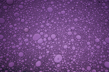Deep Lilac abstract  background from Volcanic Backgrounds Series. Oil stains on the water. Water bubbles. Color therapy, meditation, relaxation foto.