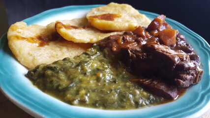 Caribbean Callaloo, Stew Chicken and dumplings 