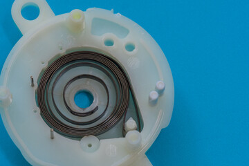 Closeup of constant tension spring