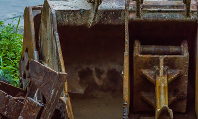Rusted, dirty backhoe buckets