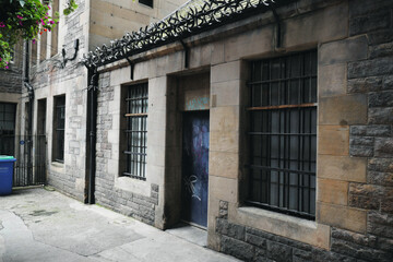 Fototapeta na wymiar Building with metal door, city of Edinburgh Scotland.