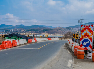 Roadwork directional signs and traffic barriers