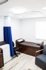 Recovery room at oral surgery dental specialty medical practice office where patients lay to recover from anesthesia