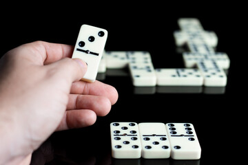 domino on hand