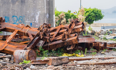 Fototapeta premium Closeup of large rusted railroad cars