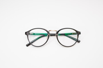 Vintage round eyeglasses on white background