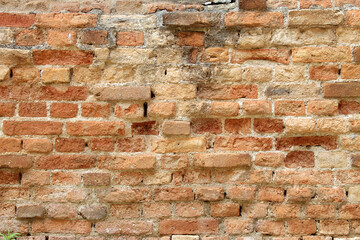 Brick wall worn in demolition