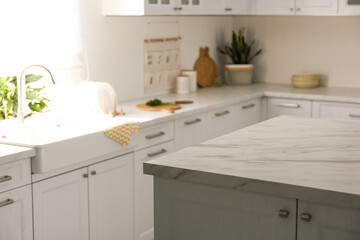 Empty white marble table in kitchen. Stylish interior design