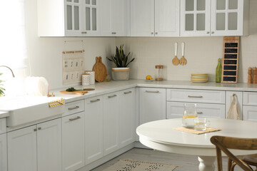 Elegant kitchen interior design with white round table