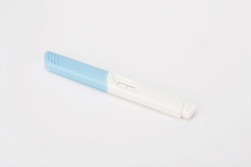 The pregnancy test is on a white background

