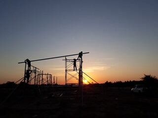 Fototapeta na wymiar power line at sunset