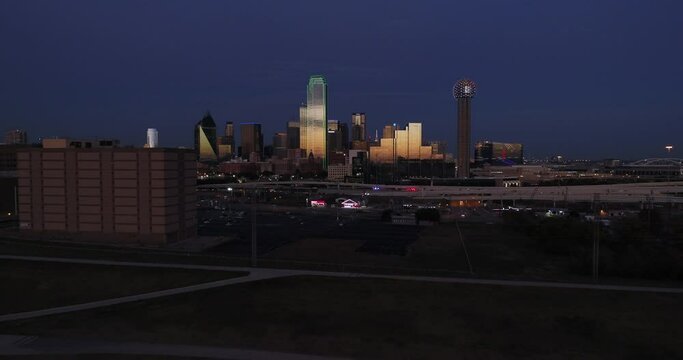 Dallas skyline drone at twilight pull