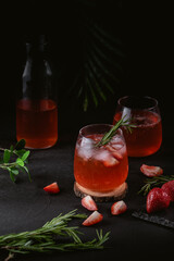 Iced lemonade with strawberry and rosemary