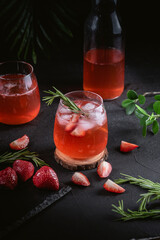 Iced lemonade with strawberry and rosemary
