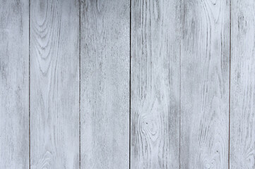 Fototapeta premium White hardwood background, blank copy space with vertical painted planks, wooden texture, table top for surface. For design in rustic or rural style
