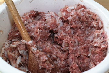 Preparing stuffed cabbage, Polish cuisine specialty.