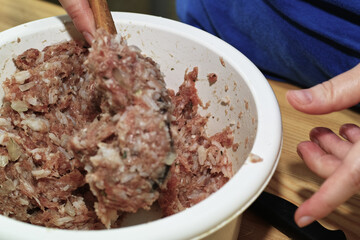 Preparing stuffed cabbage, Polish cuisine specialty.