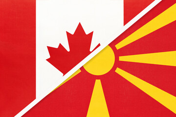 Canada and North Macedonia, symbol of national flags from textile. Championship between two countries.