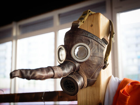 Gas mask with a trunk from leather.
