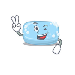 A joyful soap cartoon mascot style show two fingers pose
