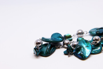 Beautiful Turquoise jewellery stones on plain background