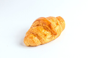 freshly baked croissant on white background.