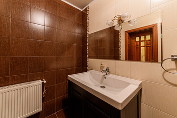 Russia, Moscow- February 07, 2020: interior room apartment modern bright cozy atmosphere. general cleaning, home decoration, preparation of house for sale. bathroom, sink, decoration elements, toilet
