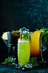 Set of colored cocktails in glasses at the bar. Menu bar. Alcohol.