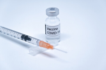 Covid-19 vaccine with syringe